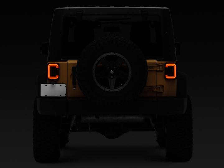 Raxiom 07-18 Jeep Wrangler JK Axial Series LED Halo Tail Lights- Black Housing (Dark Smoked Lens)